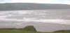 Photo of Gwbert beach - Across the bay on a windy day
