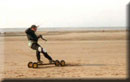 Image of me tailsliding my kite-mountainboard.